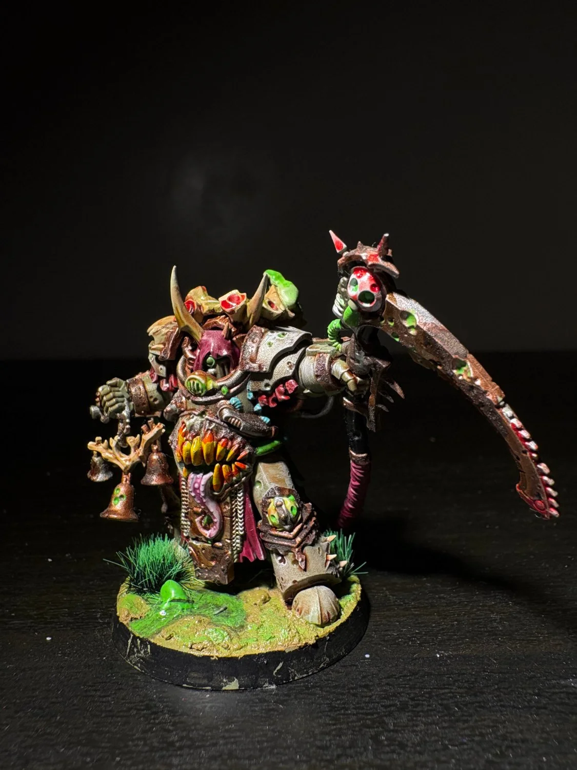 Champion with scythe and hanging bells
