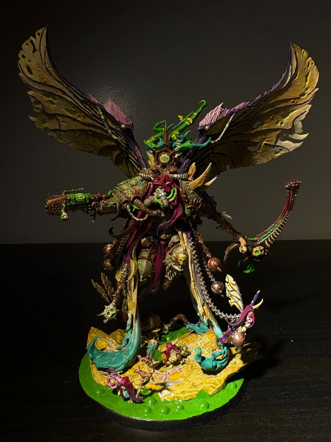 Winged warlord with tattered wings and a long scythe