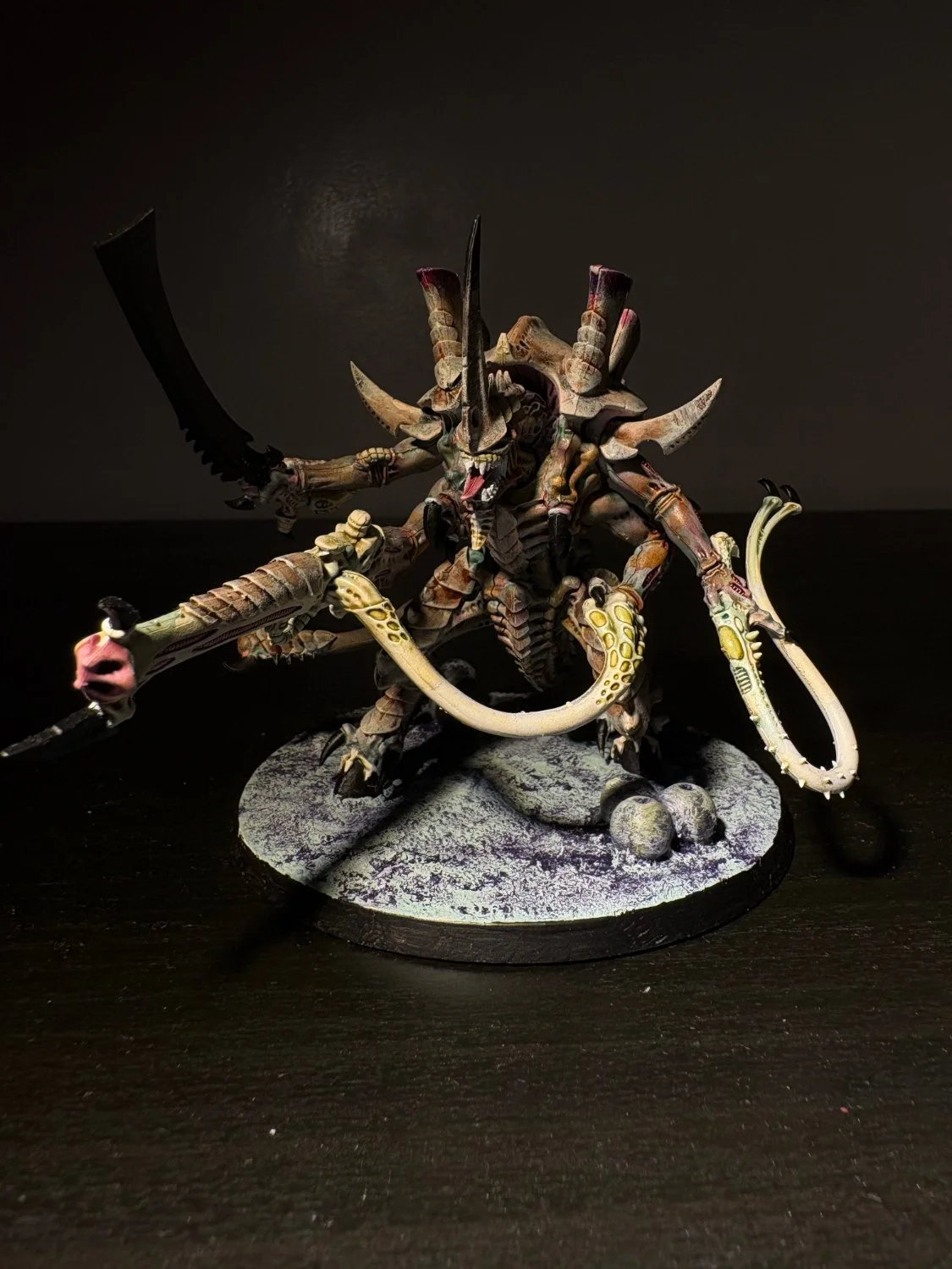 Four-armed bladed leader creature