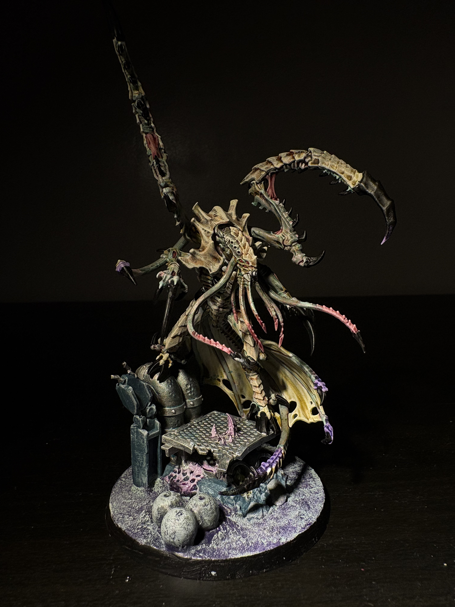 Winged tyranid over ruined terrain
