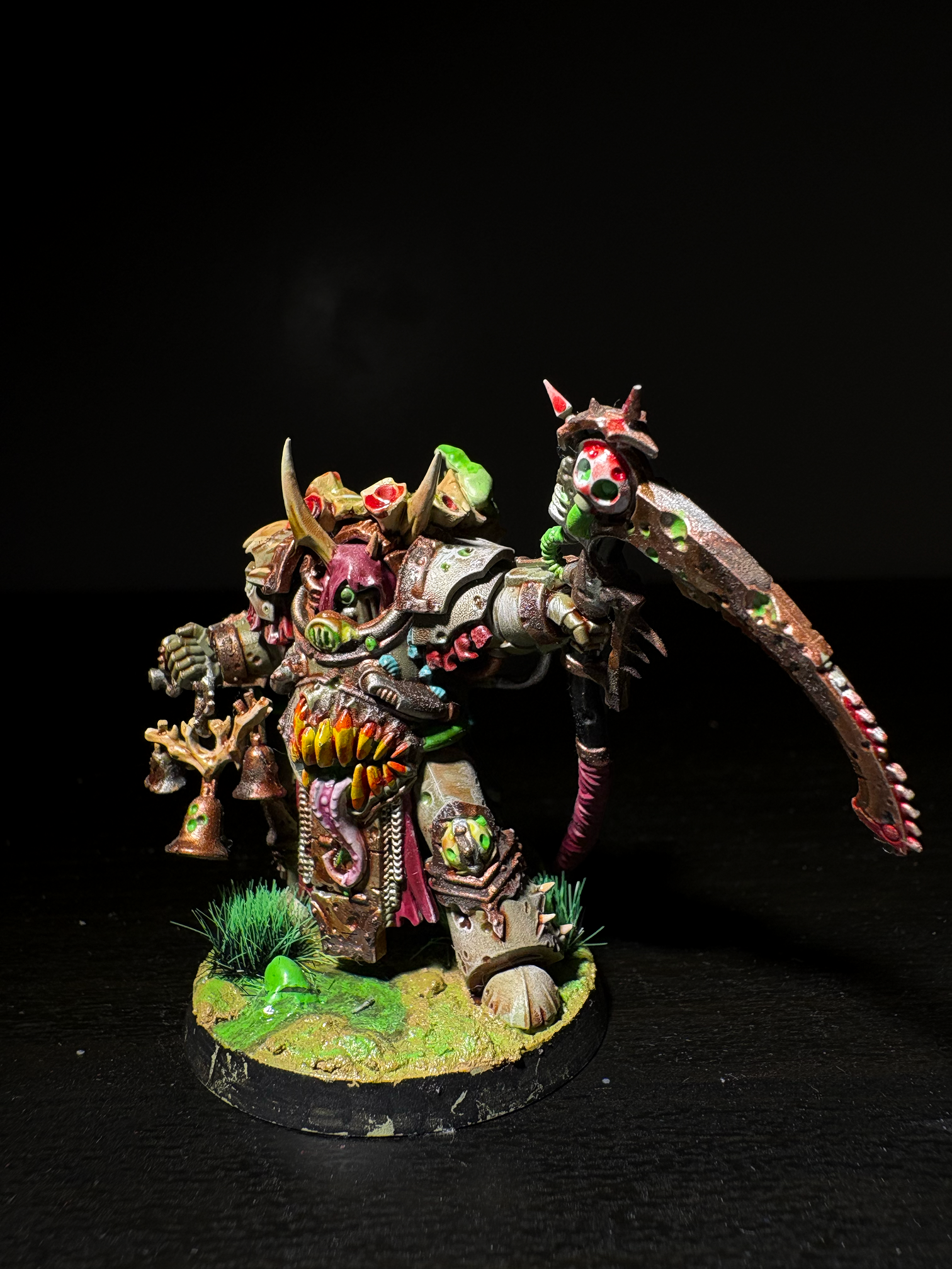 Champion with scythe and bells